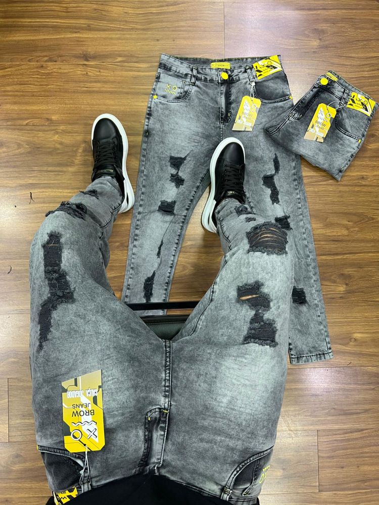 Calça jogador Cinza Clara com Rasgos escuro